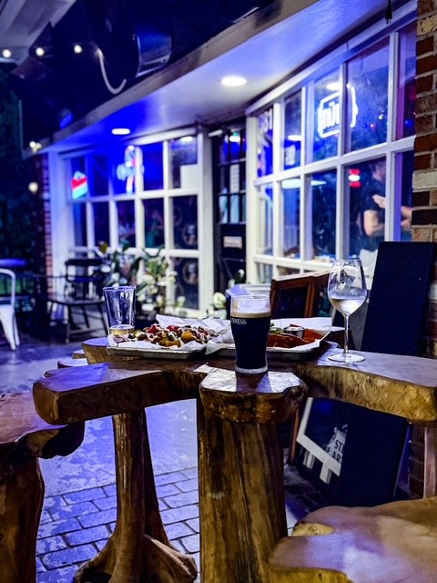 Outdoor patio seating area at The Salty Zebra Bistro Jupiter Florida - evening ambiance for private events