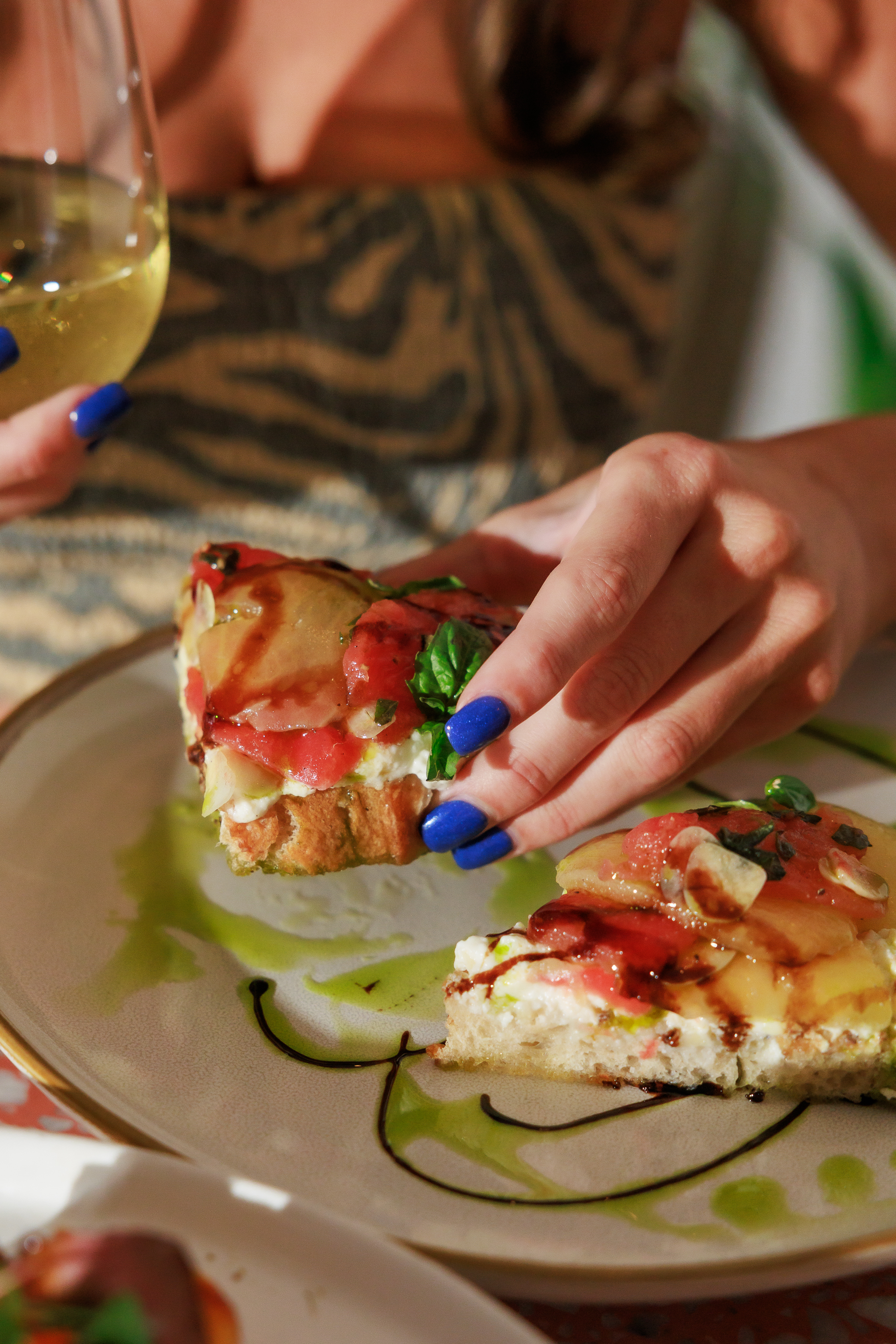 Chef serving pappardelle pasta at Salty Zebra Bistro Jupiter